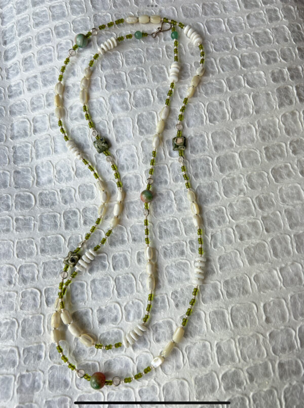 Olive and cream tone long necklace with shell, mother of pearl and stone