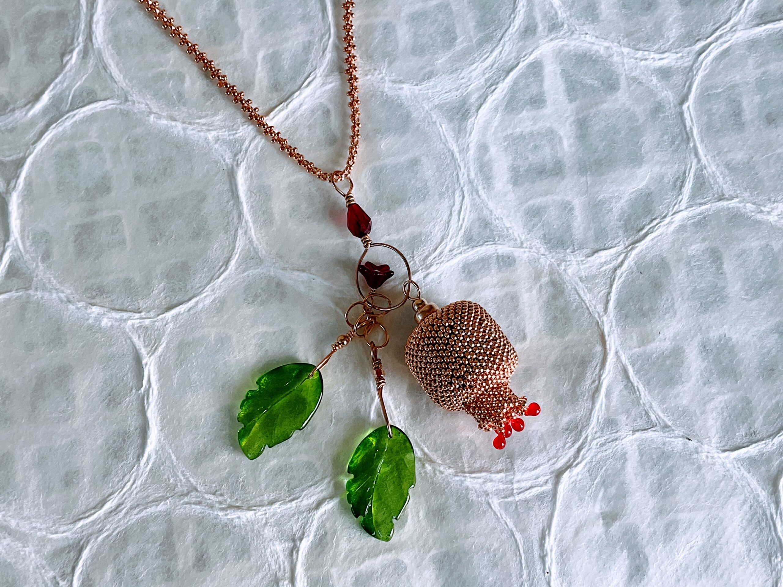 Golden beaded pomegranate necklace with beaded chain