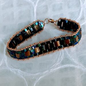 Iridescent blue/purple and gold flat woven TILA bead bracelet